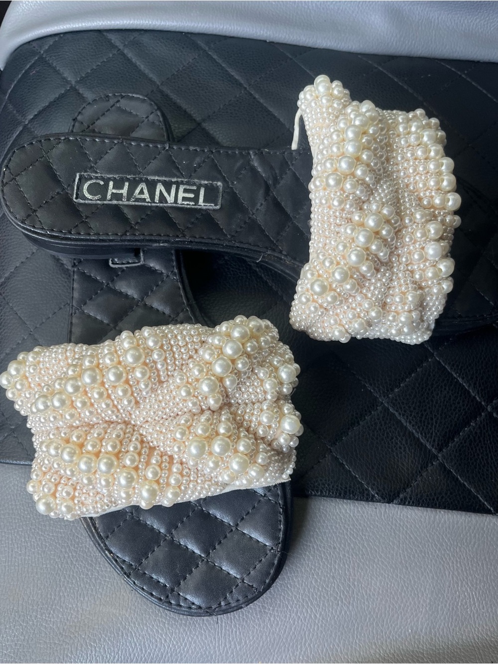CHANEL Pearl-Embellished Black Slide Sandals with Ivory Beaded Straps